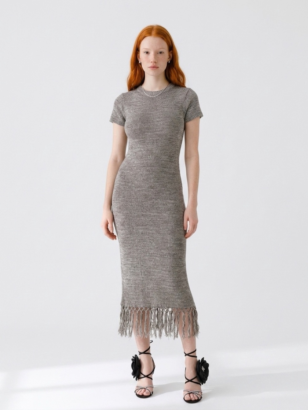 Heather gray marled fringe hem knit dress from the boutique brand Klesis